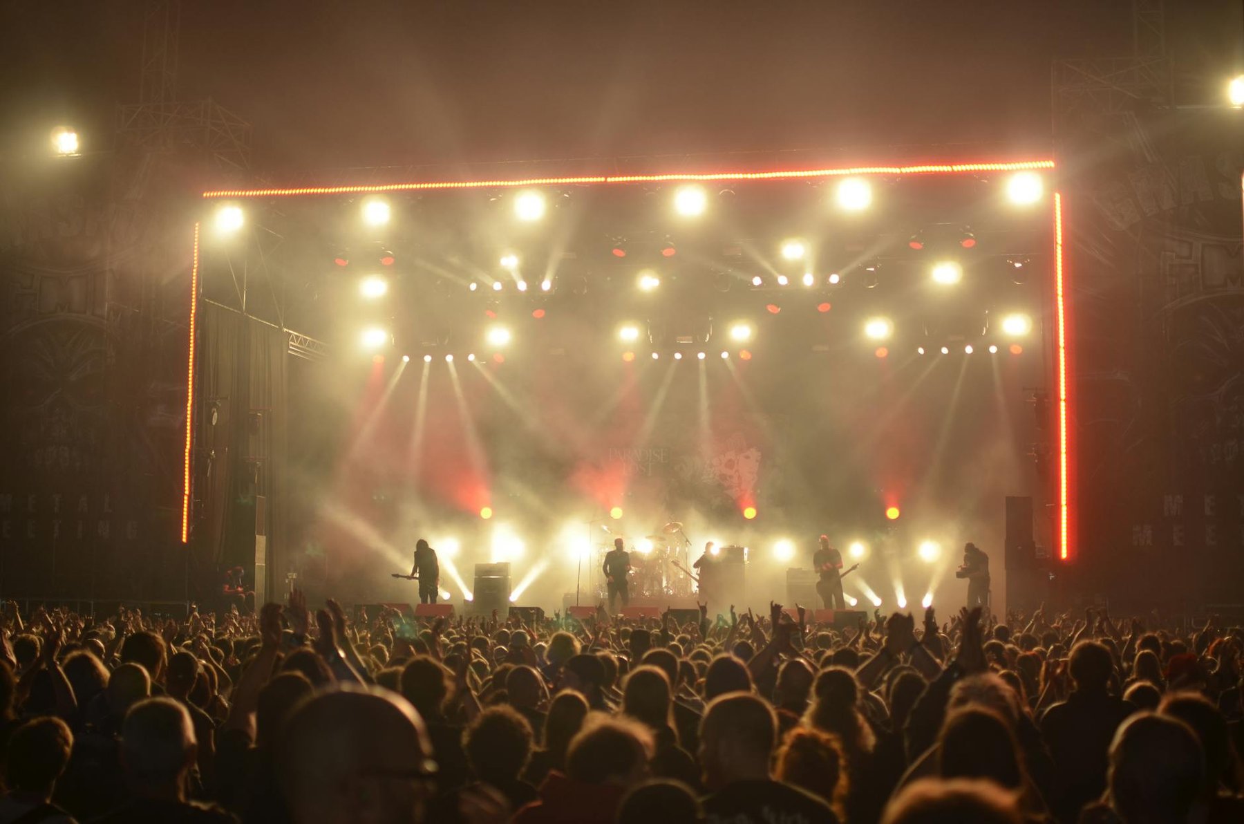 Outdoor Eden Park stadium concert at night in Auckland