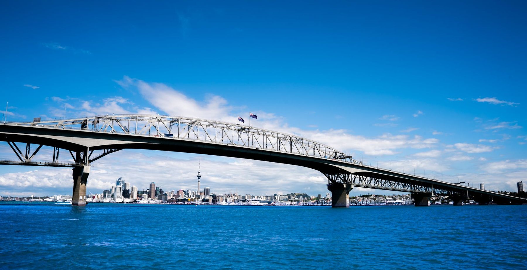 Auckland Viaduct Harbour with superyachts, restaurants and waterfront hotels