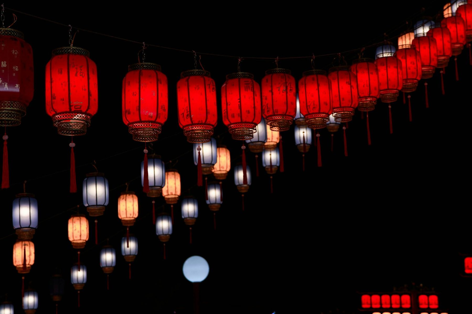 Lantern festival coloured lanterns at night similar to Auckland's BNZ Lantern Festival