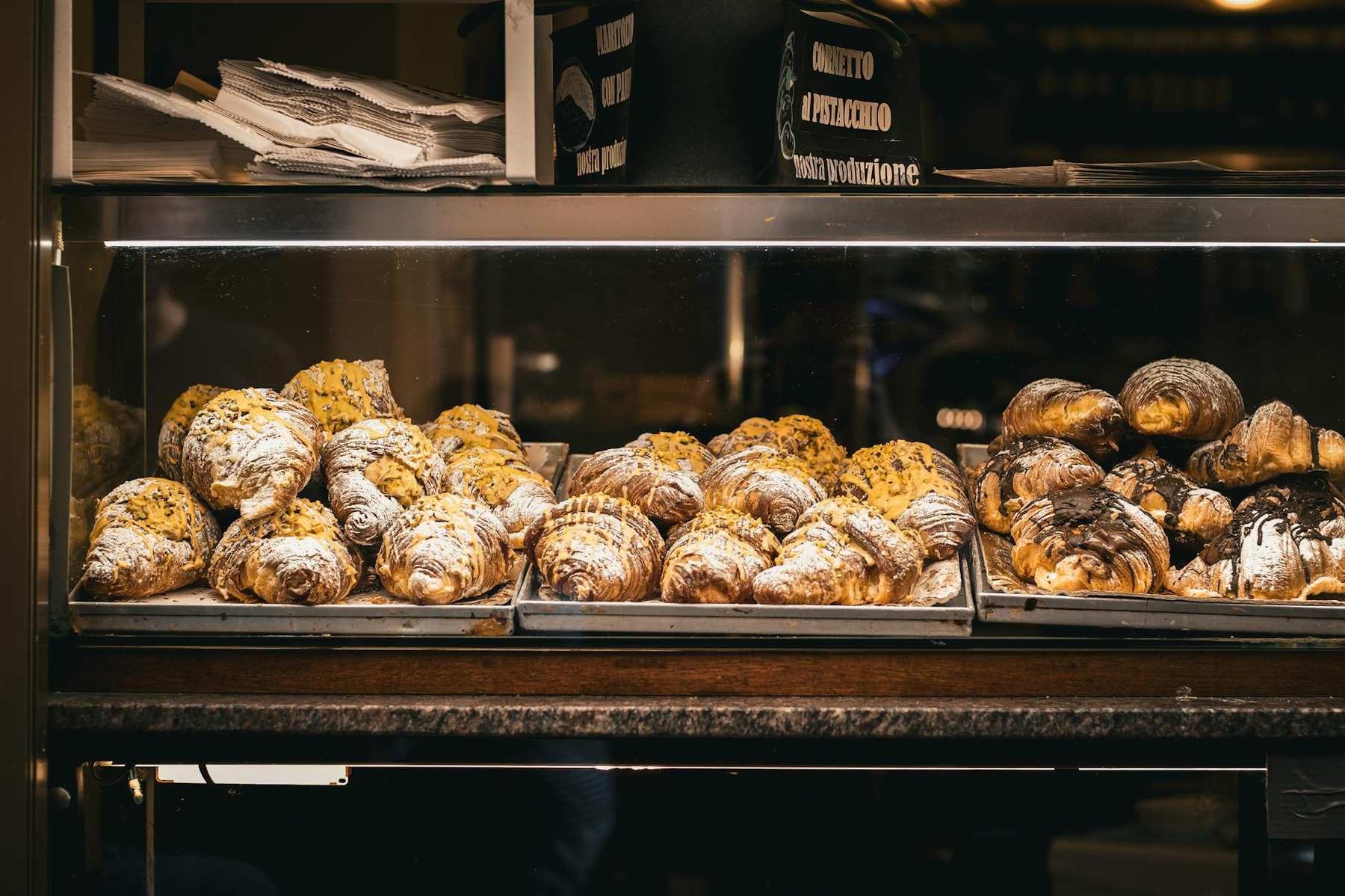 Pastries and croissants on display at an Auckland bakery cafe