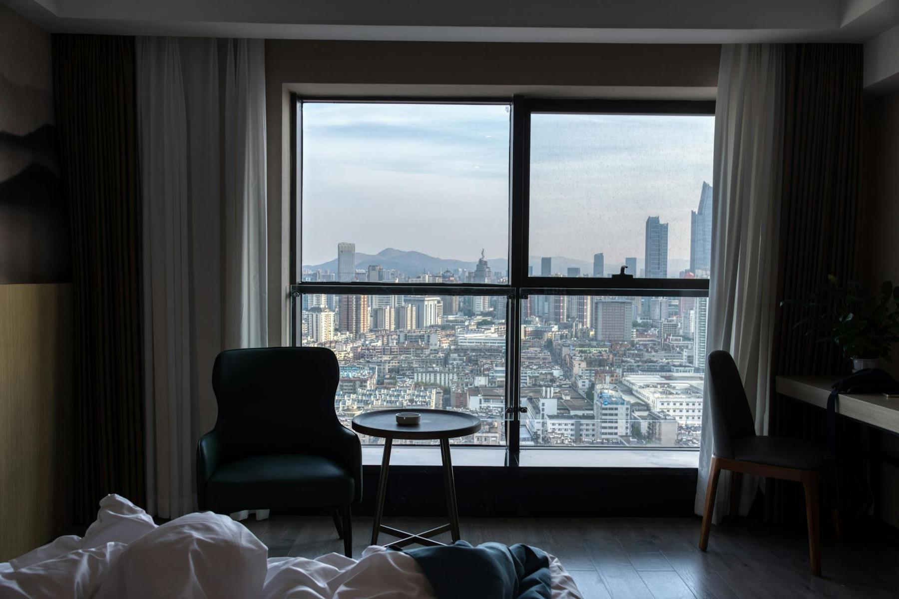Luxury Auckland CBD hotel room with skyline city view