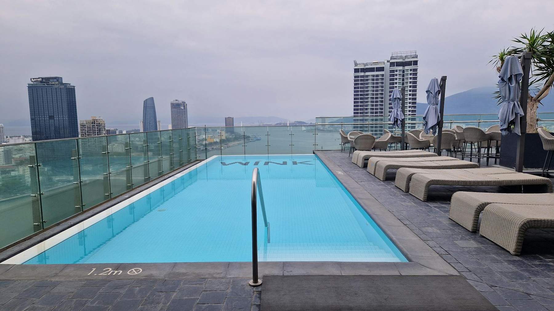 Hotel rooftop infinity pool with city views