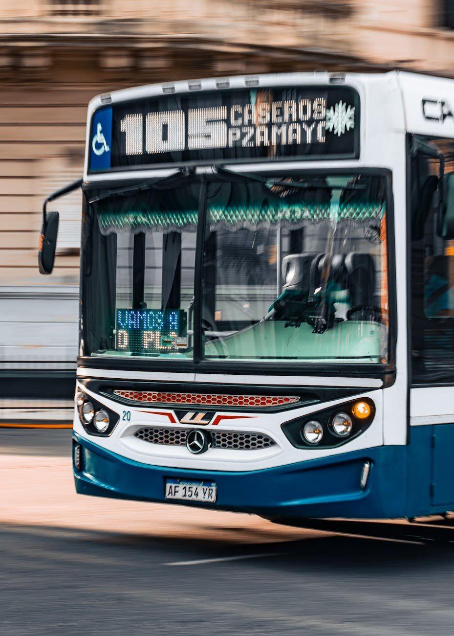 Modern city bus representing Auckland public transport network