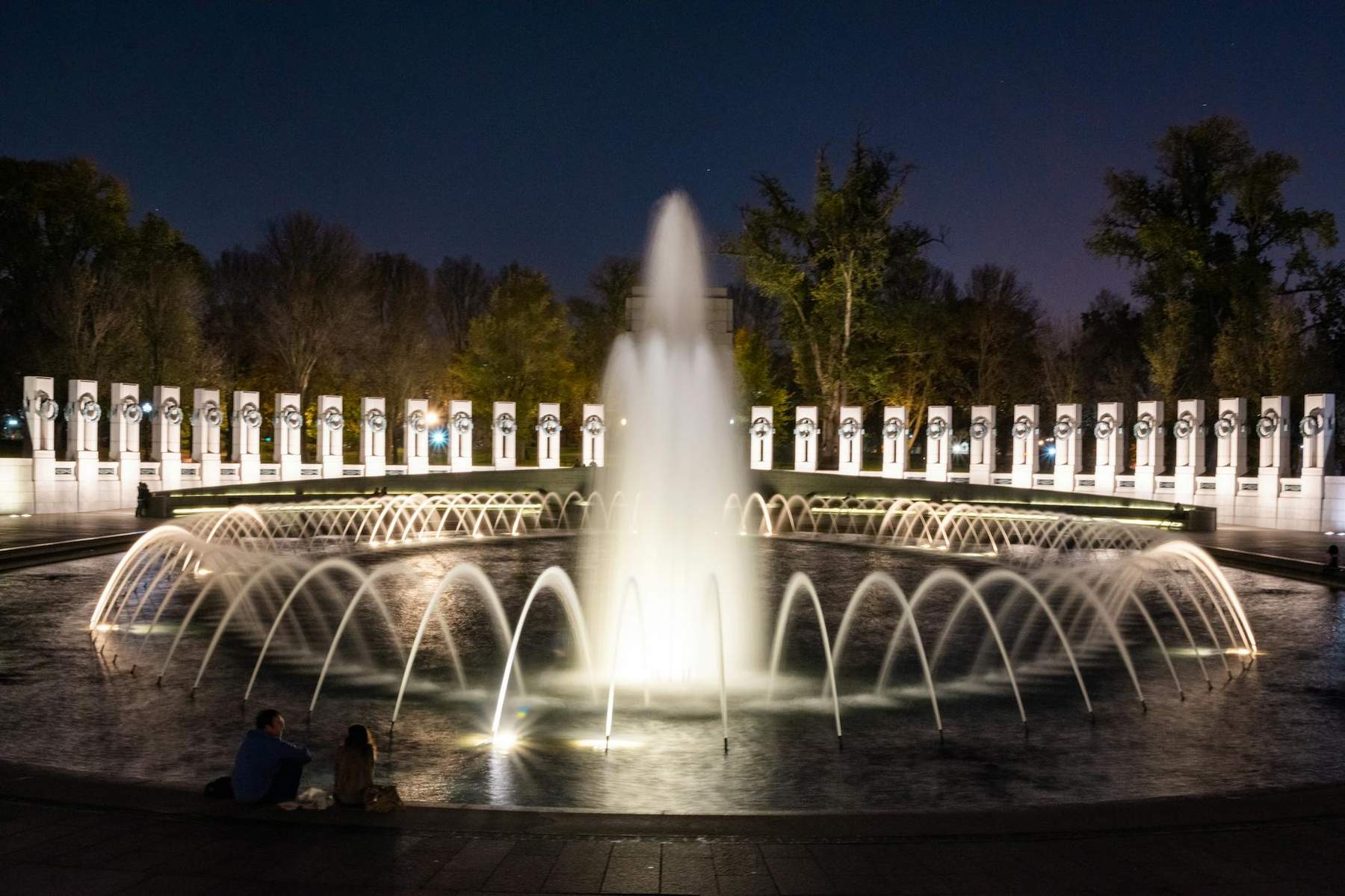 Memorial Sicilian marble fountain with water gushing in the park