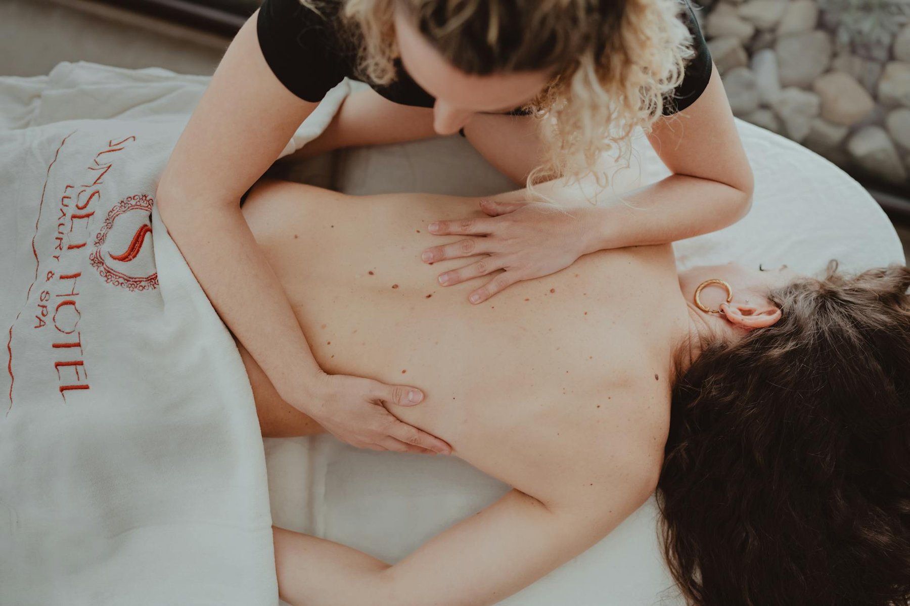 Luxury hotel spa with relaxation room and treatment menu