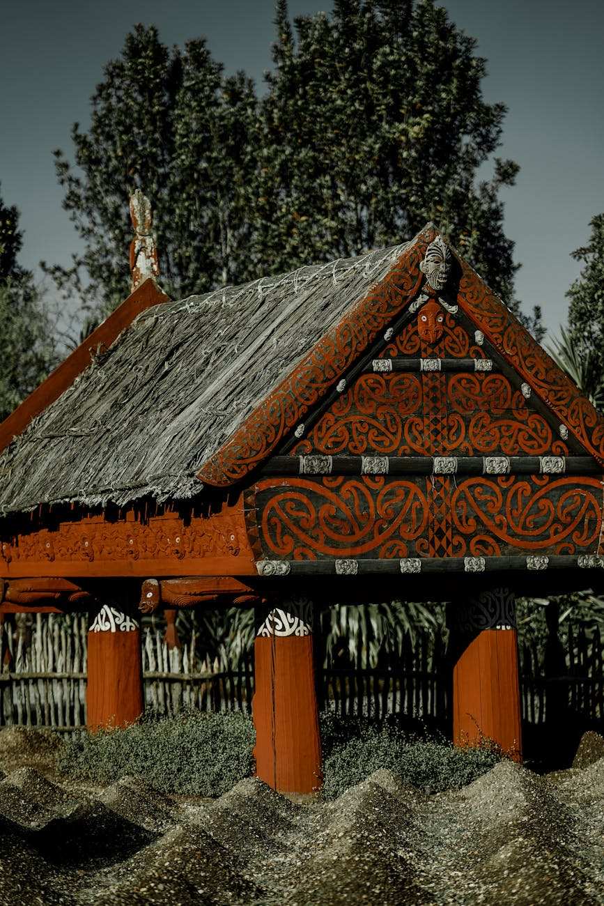 Traditional Māori waka taua war canoe with detailed carvings