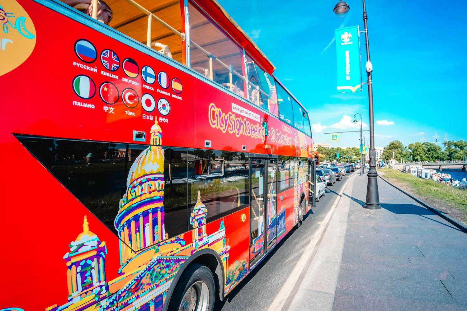 Double-decker city bus with tourists