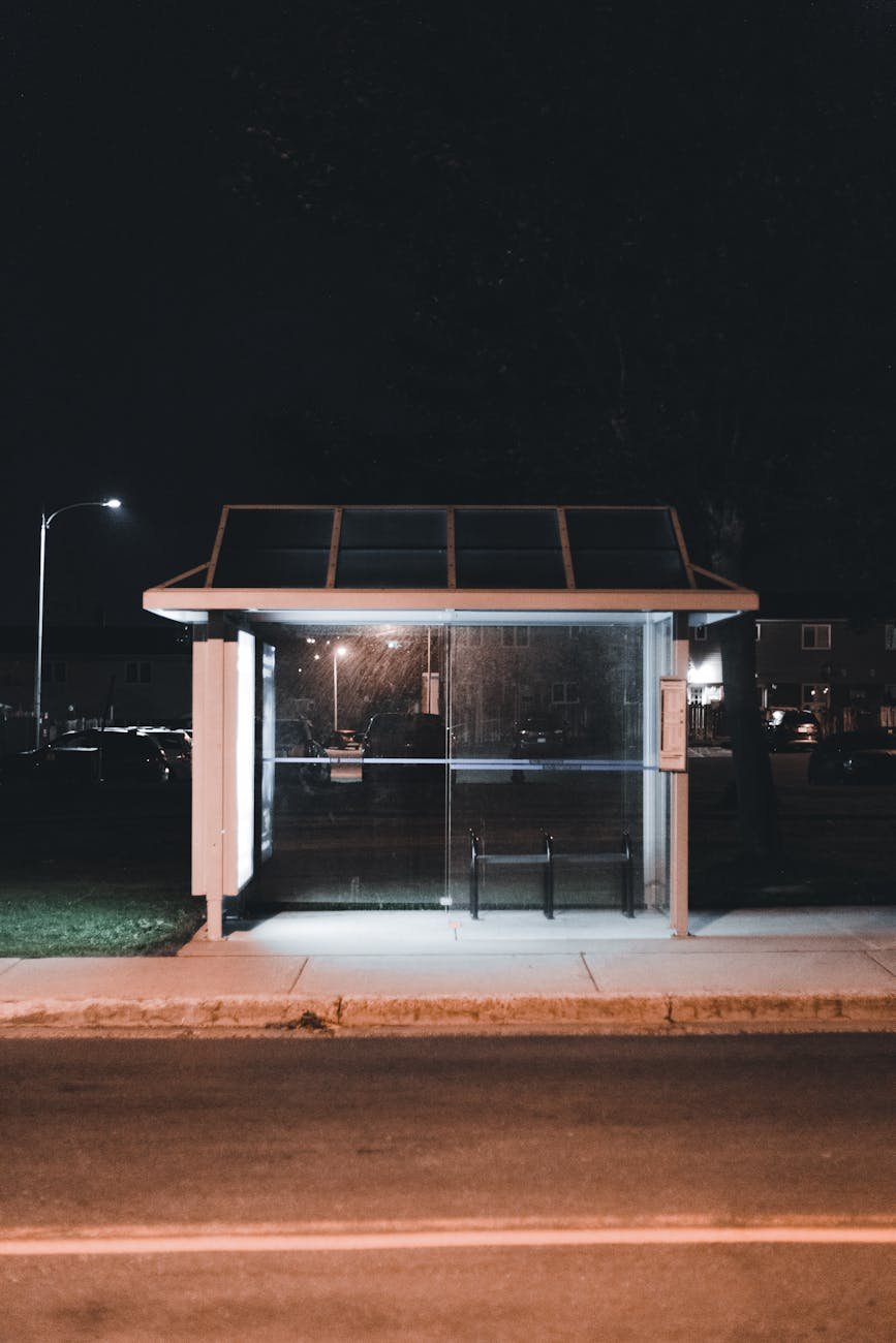 Modern bus stop with passengers waiting