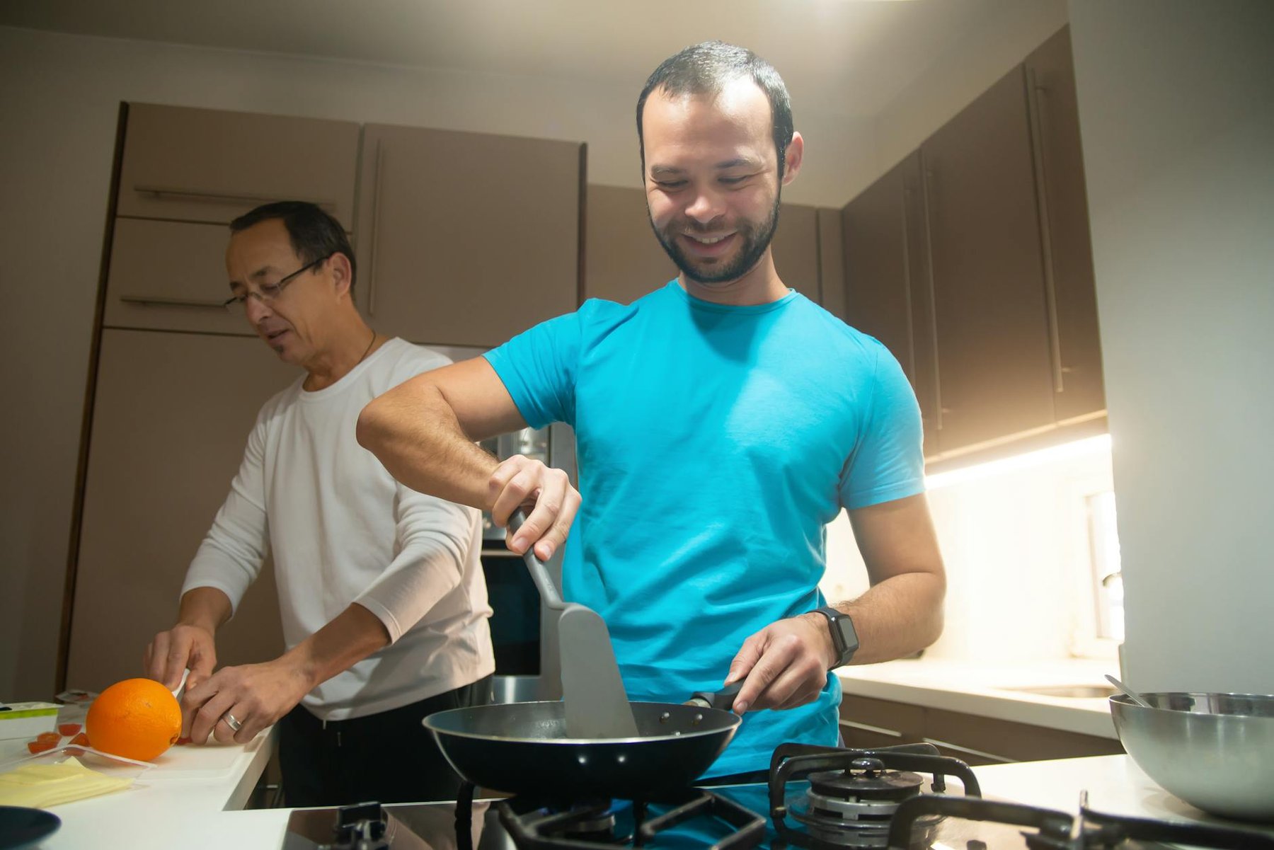 Shared kitchen at an Auckland hostel for budget travellers