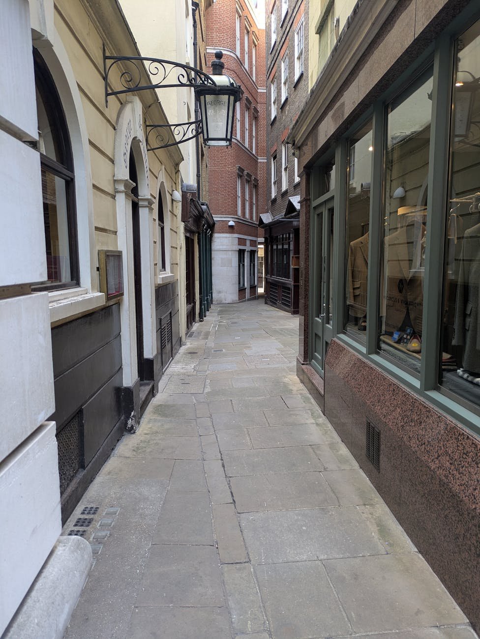 Cobbled pedestrian lane with shopping boutiques