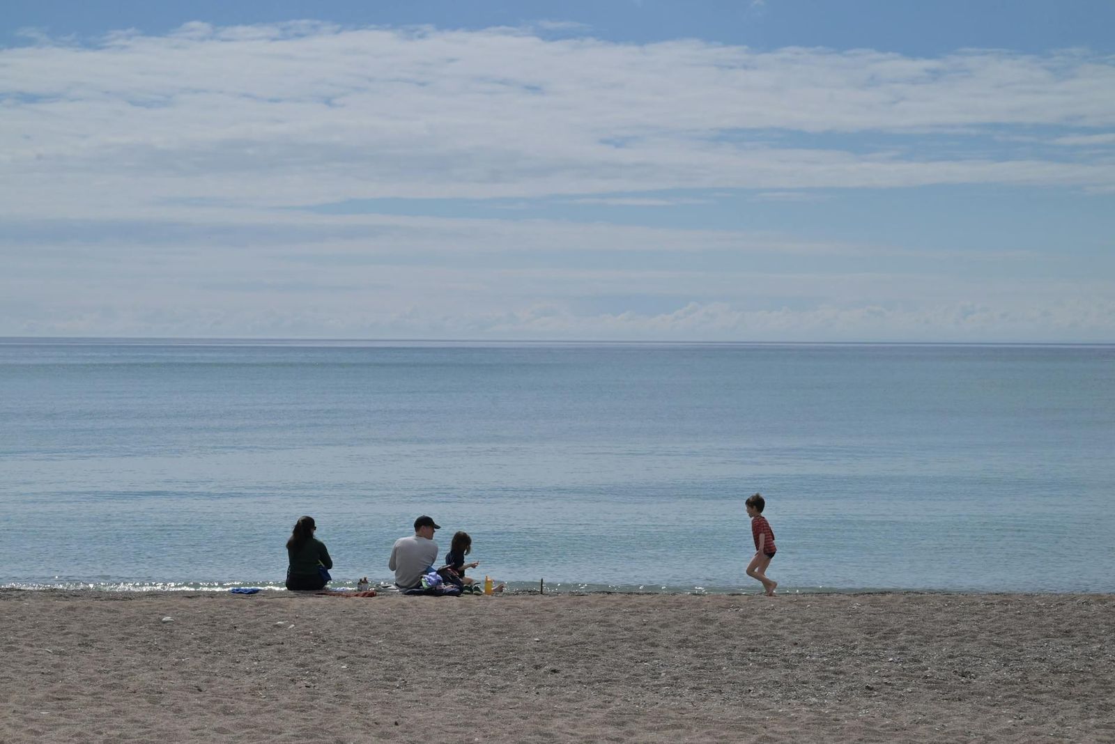 Family beaches Auckland — calm water swimming