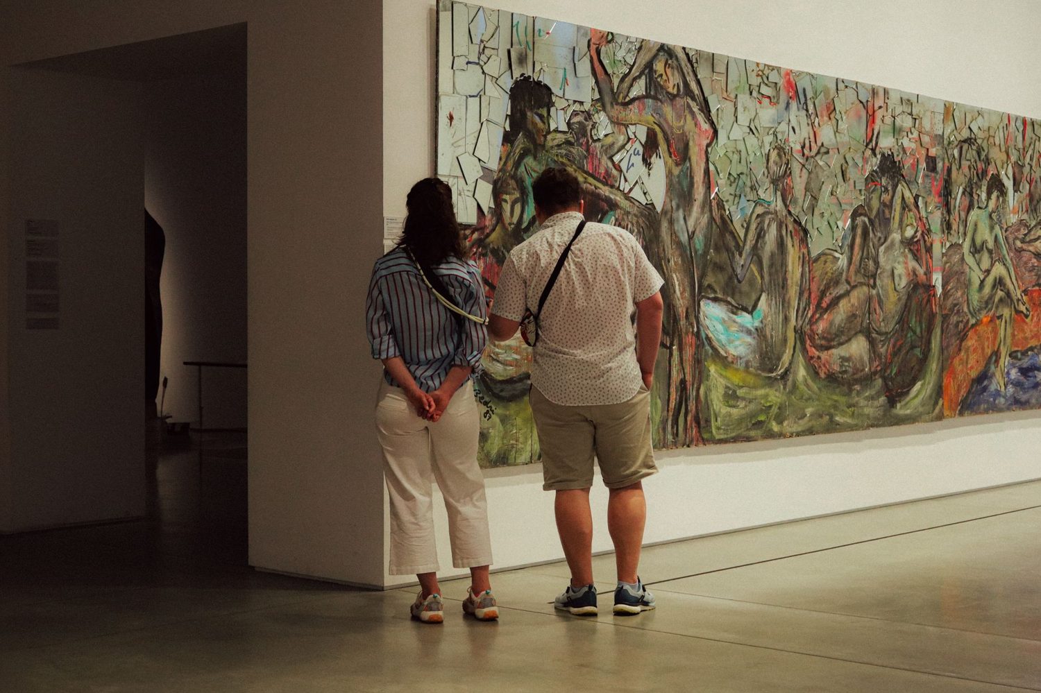 Visitors viewing a special exhibition at an art museum