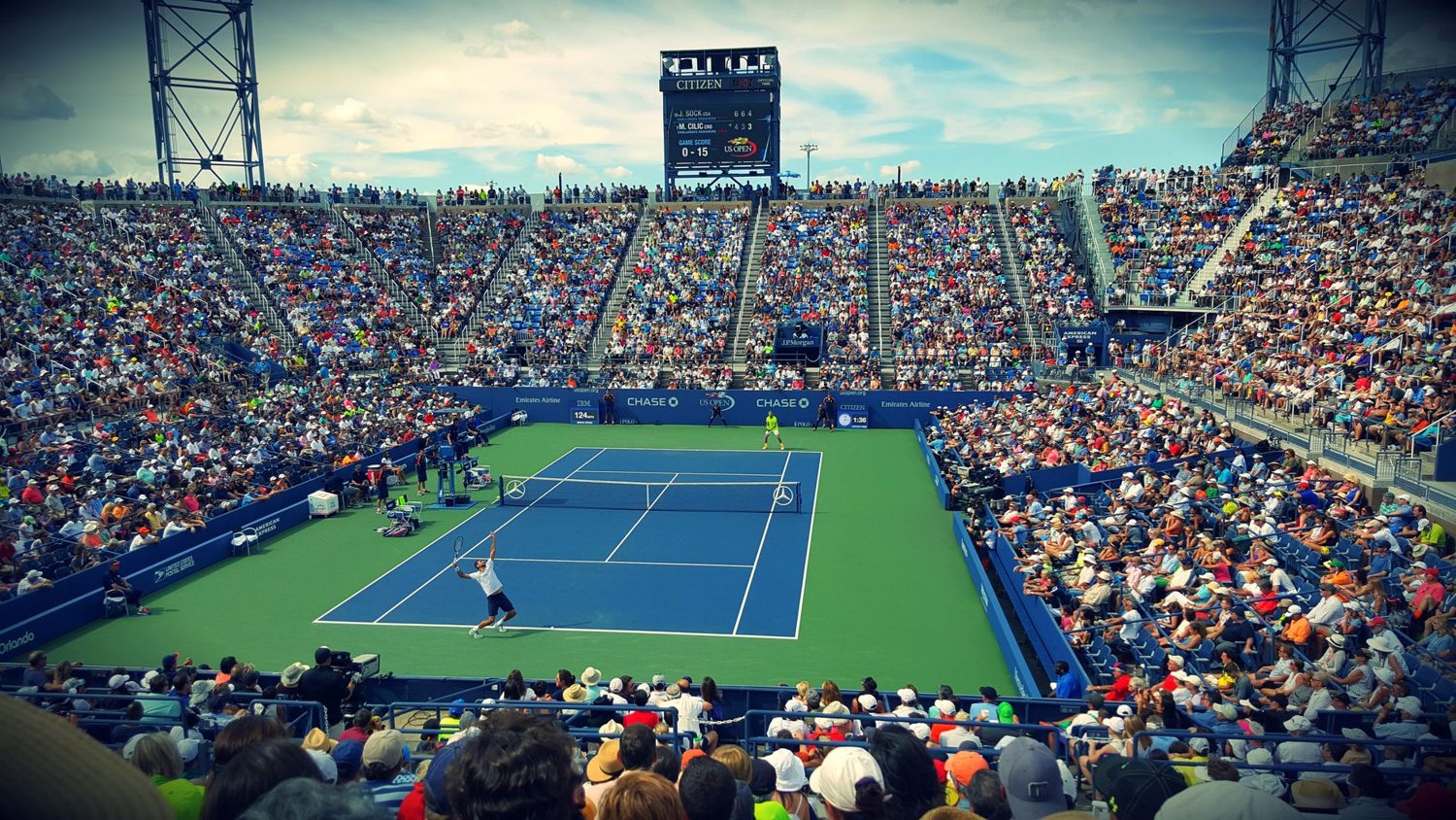 Players on court during a summer tennis tournament in Auckland