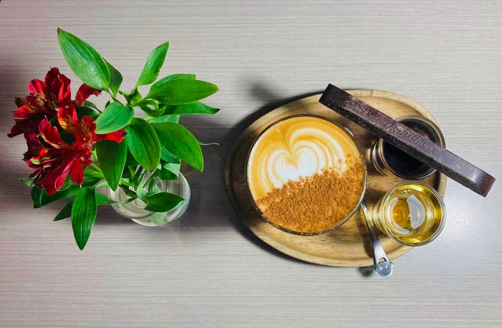 A flat white and brunch plate at an Auckland cafe