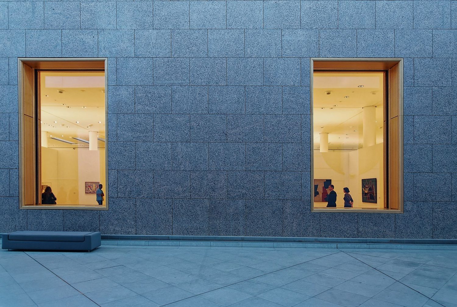 Visitors at the entrance and ticket area inside a museum