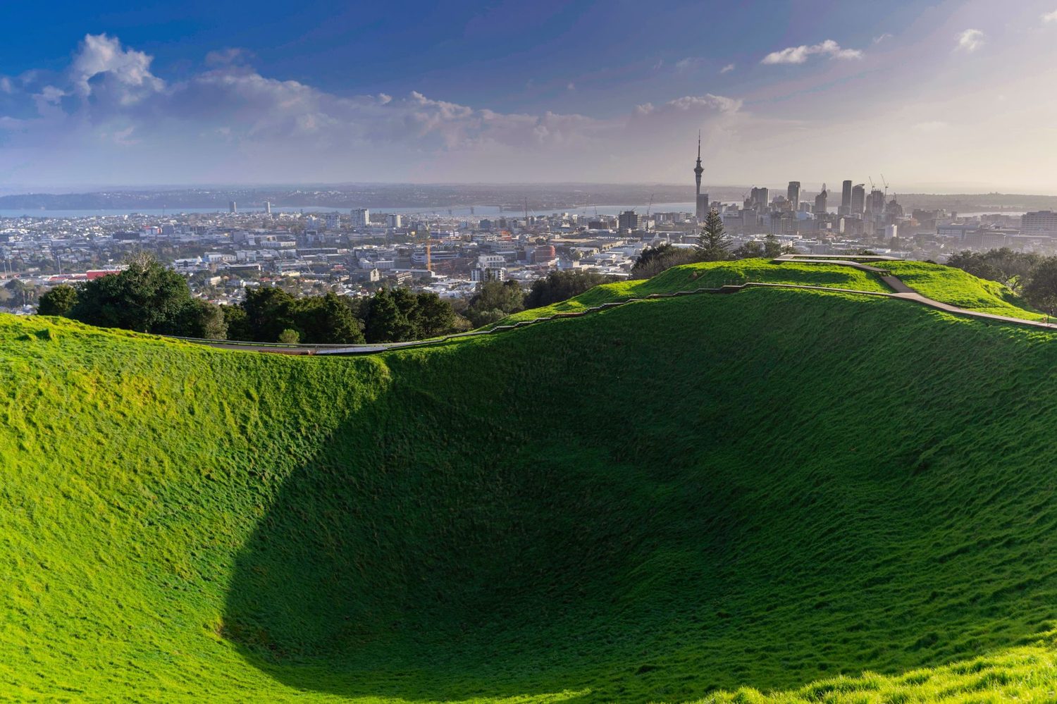 Grass-lined volcanic crater on an Auckland maunga