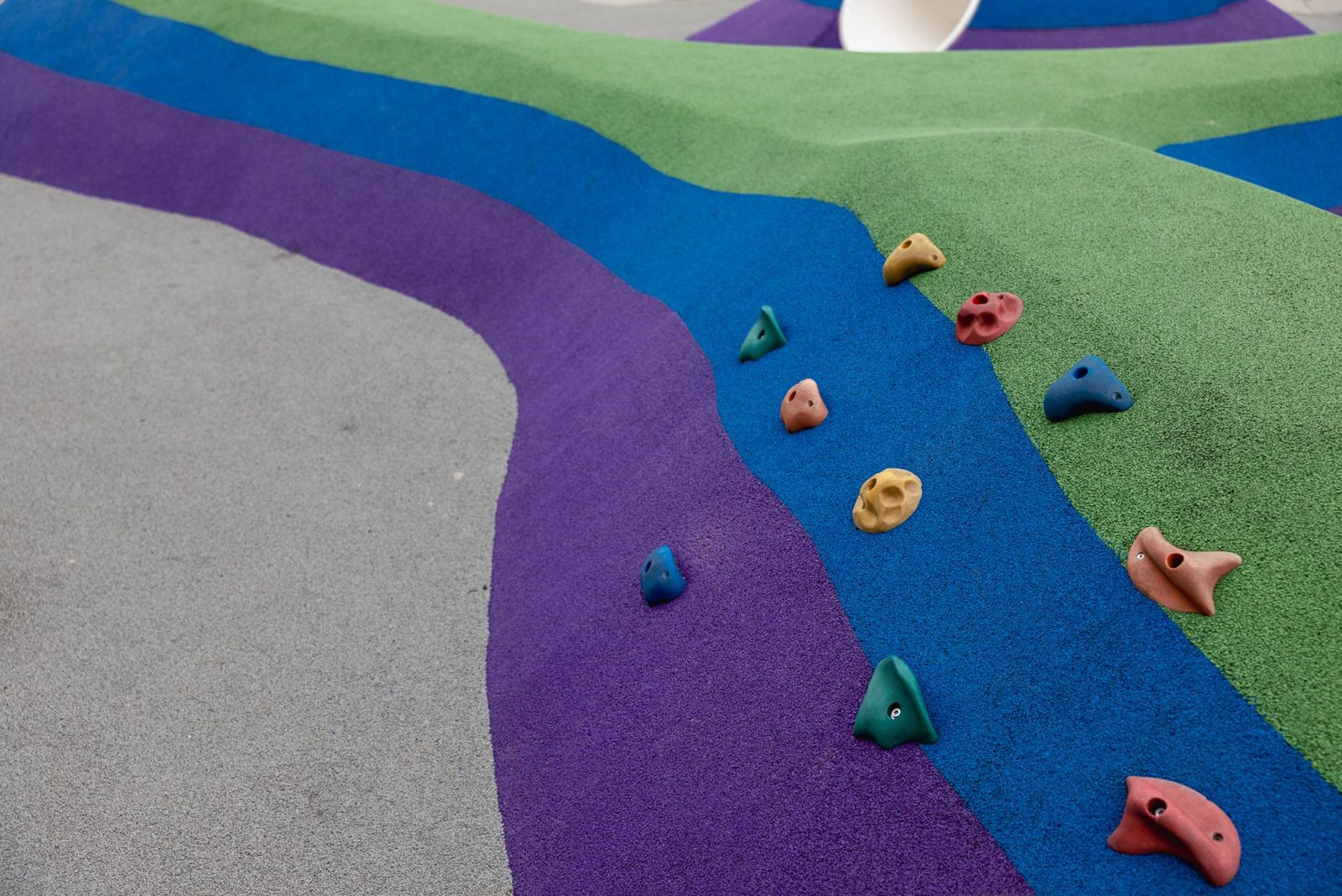 Kids playing at a colourful Auckland playground