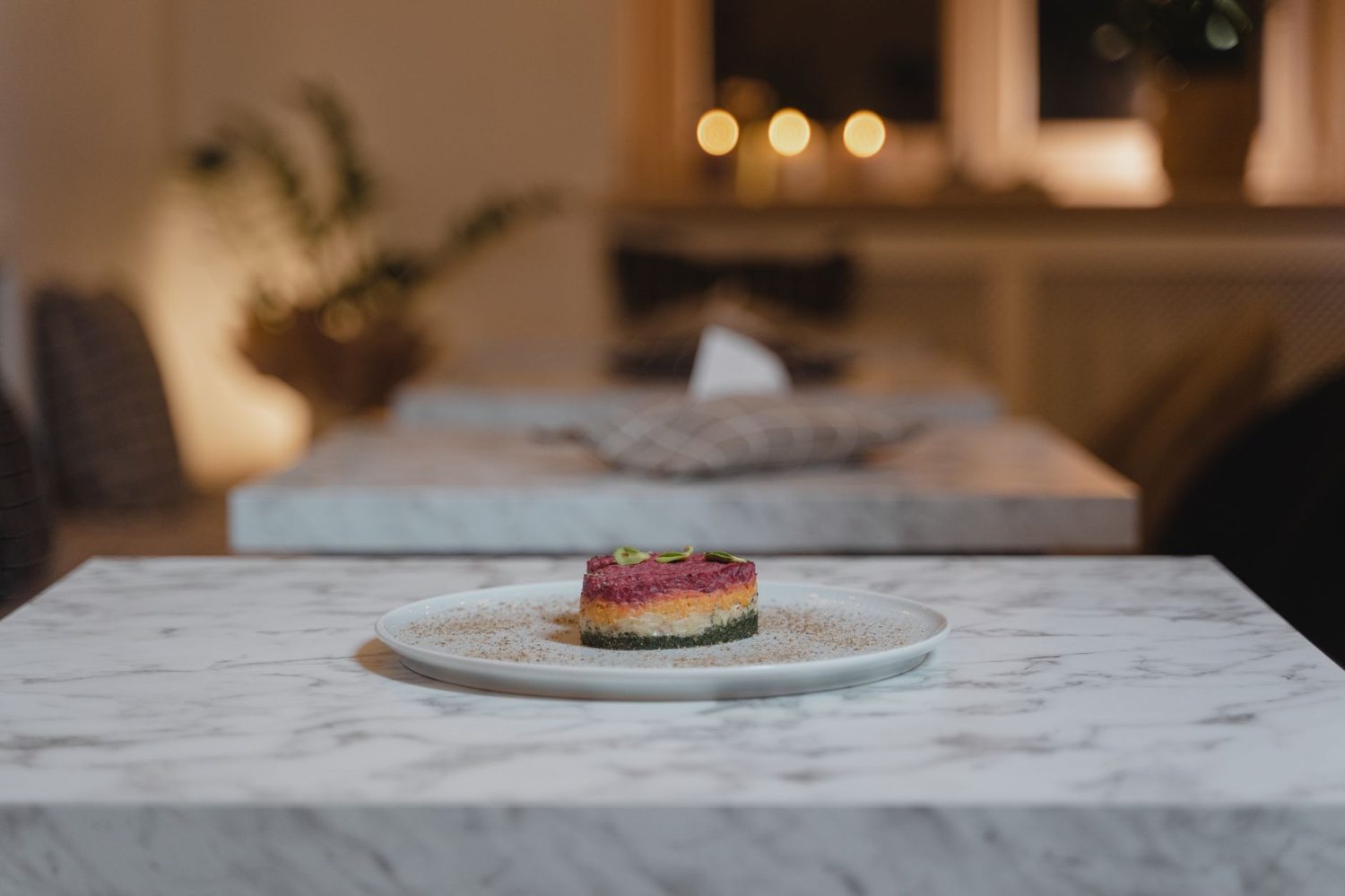 A carefully plated dish on a restaurant table