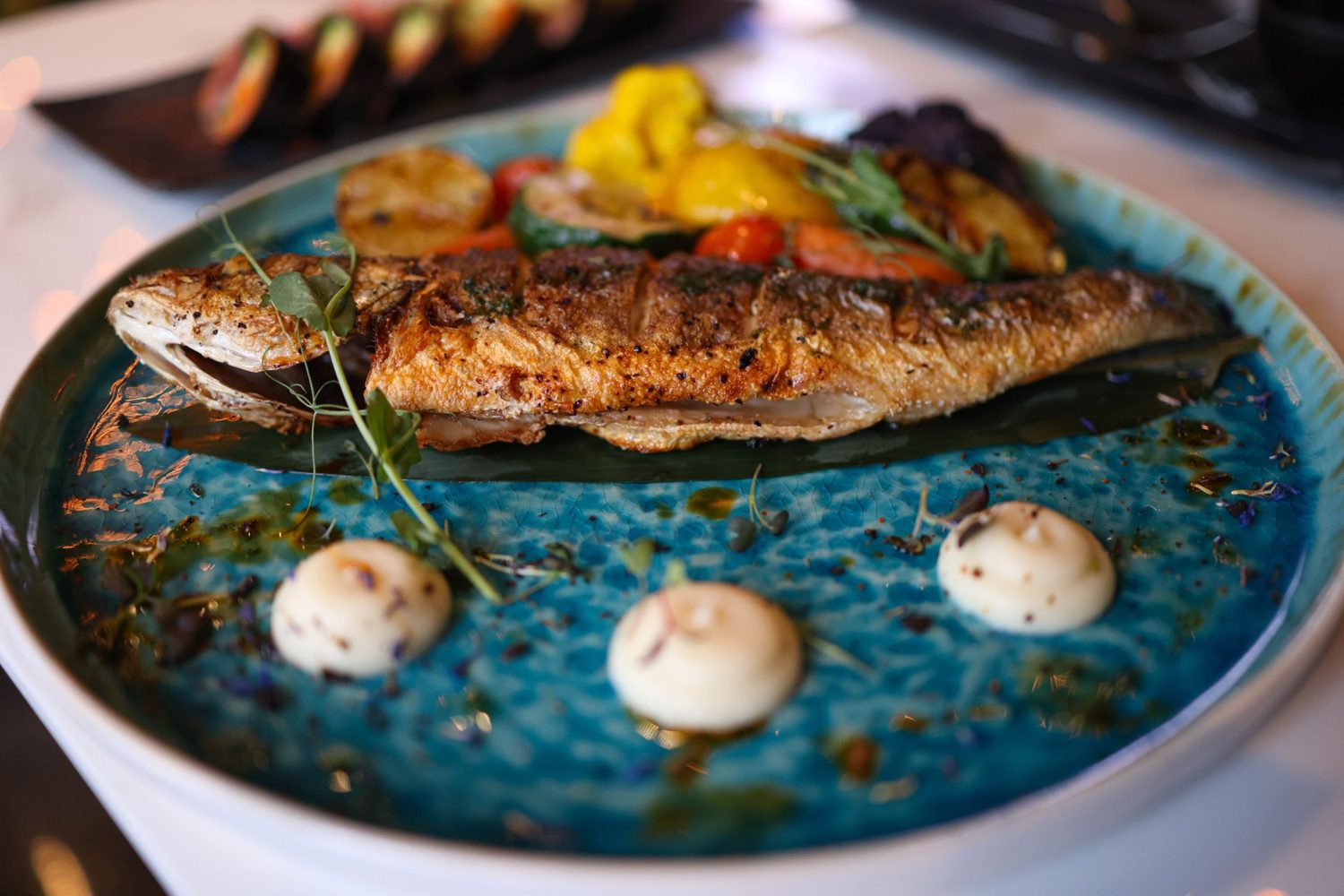 Grilled whole snapper served at an Auckland seafood restaurant