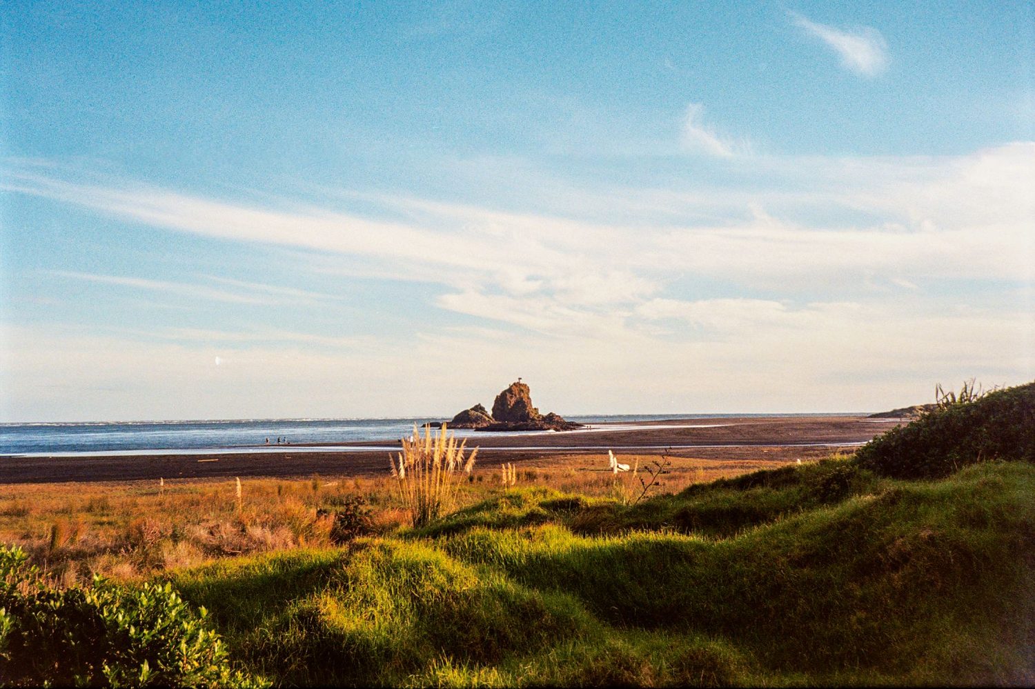 The river-mouth lagoon and offshore islets at Bethells Beach