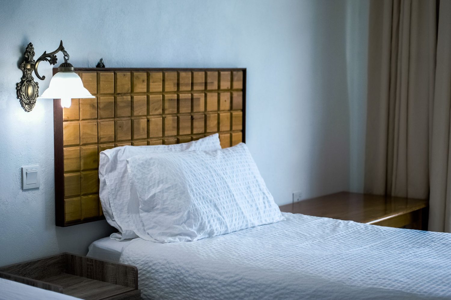 Simple, clean budget hotel room with a double bed