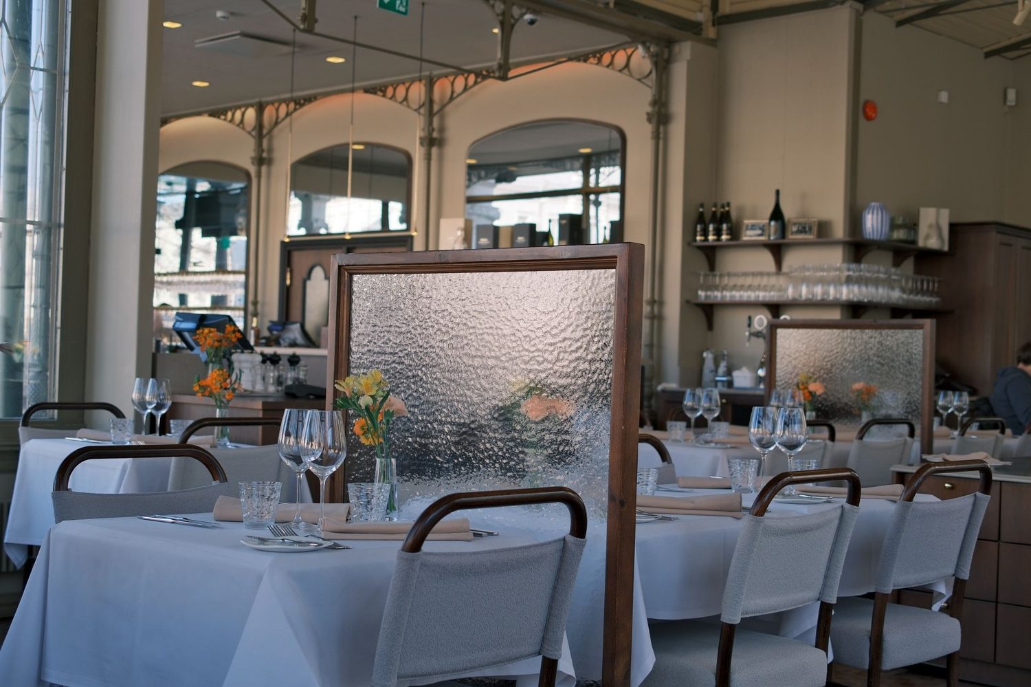 Elegant fine dining restaurant interior with skyline views