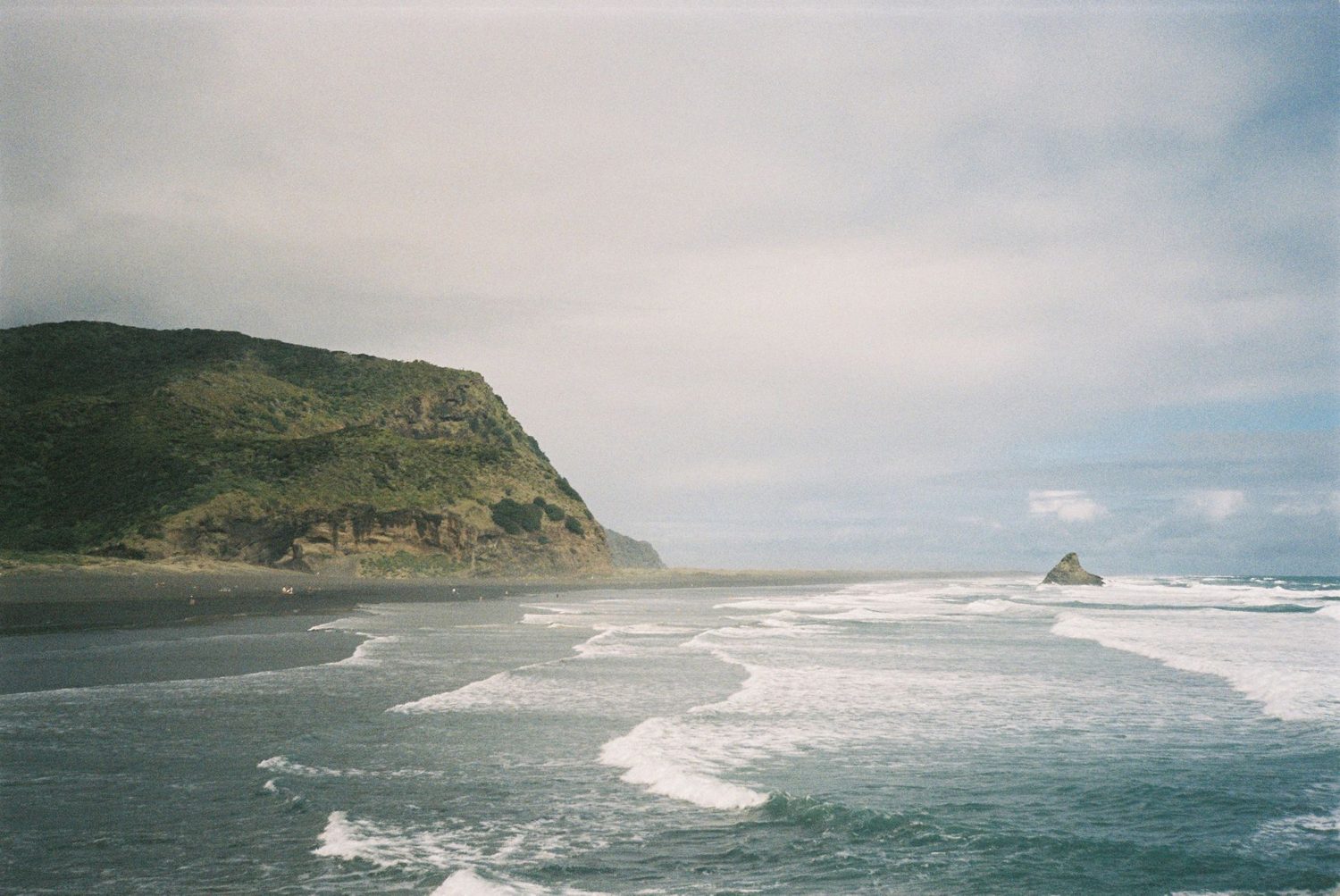 Black ironsand and heavy Tasman surf at Piha on Auckland's west coast