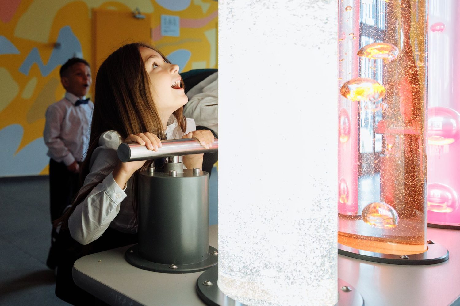 Children at an interactive museum exhibit in Auckland