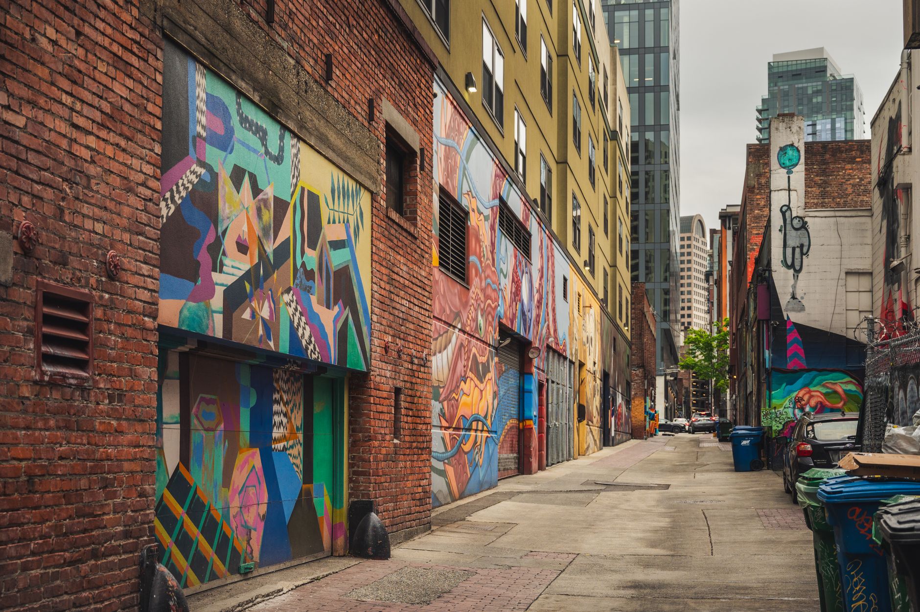 A large colourful mural on a laneway wall in central Auckland