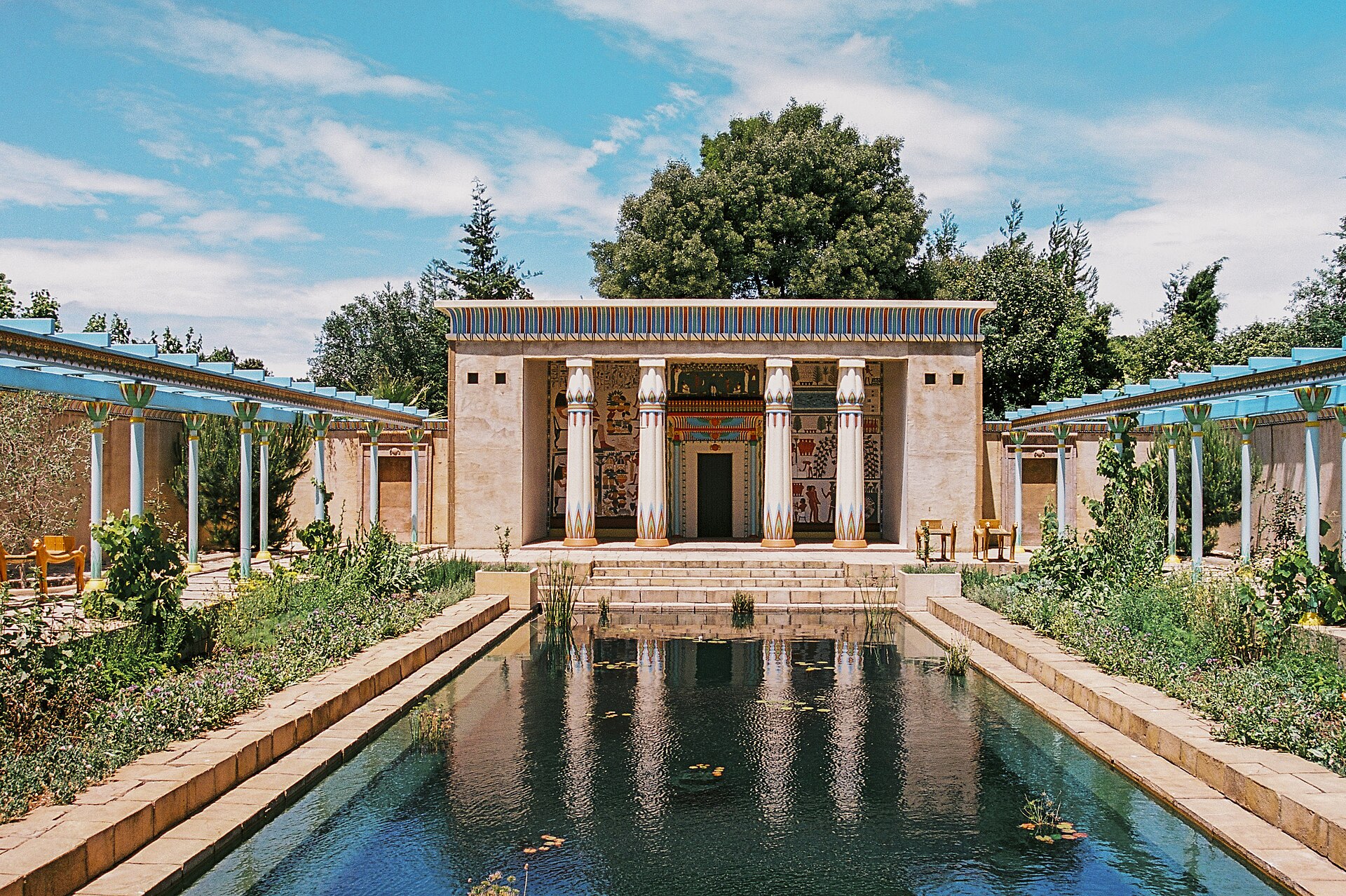 The Ancient Egyptian Garden at Hamilton Gardens, with a long reflecting pool leading to a painted, columned pavilion